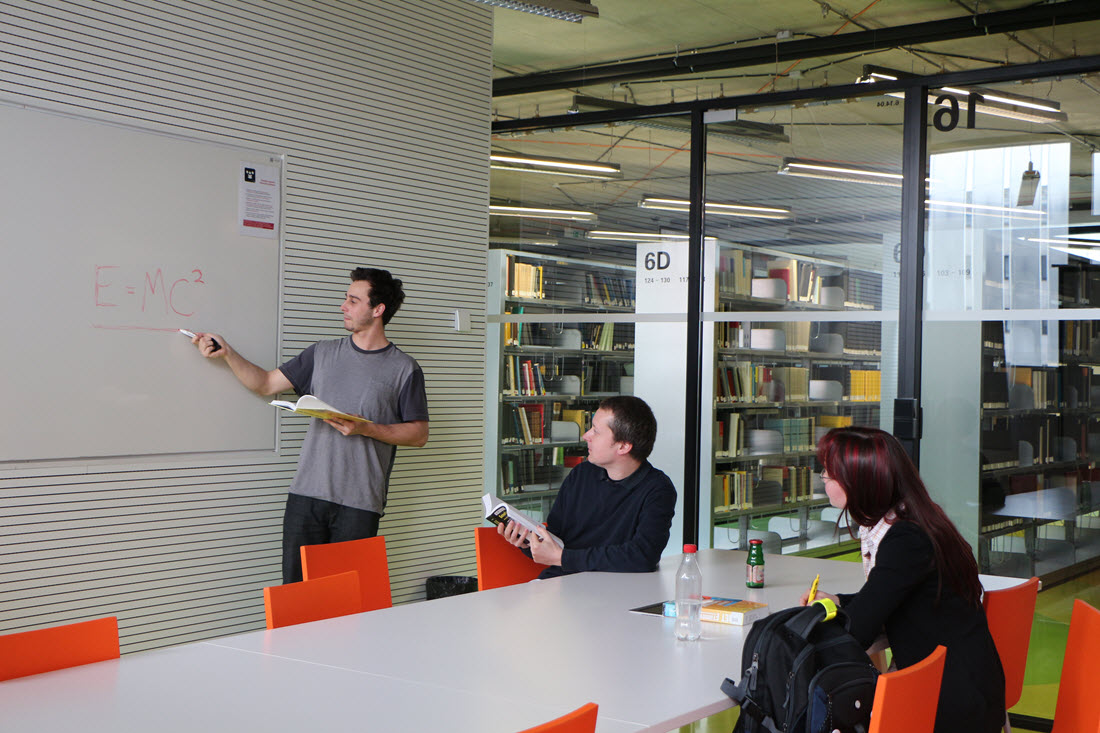 Photo: students working in a team study room